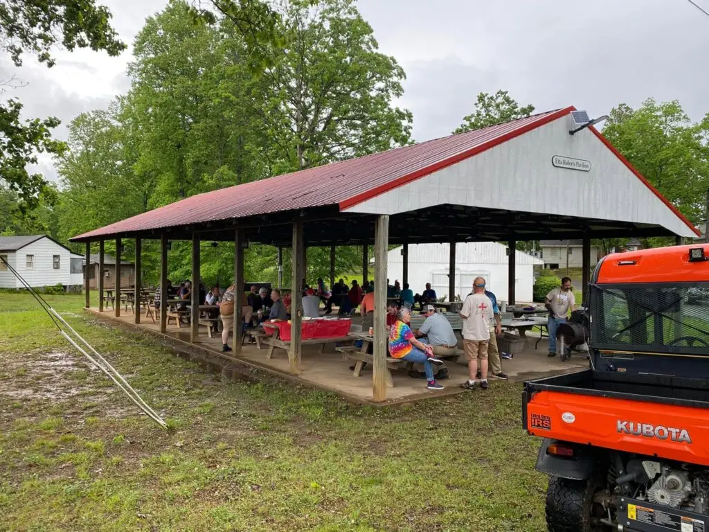 Etta Roberts Pavilion with picnic tables on the retreat center grounds