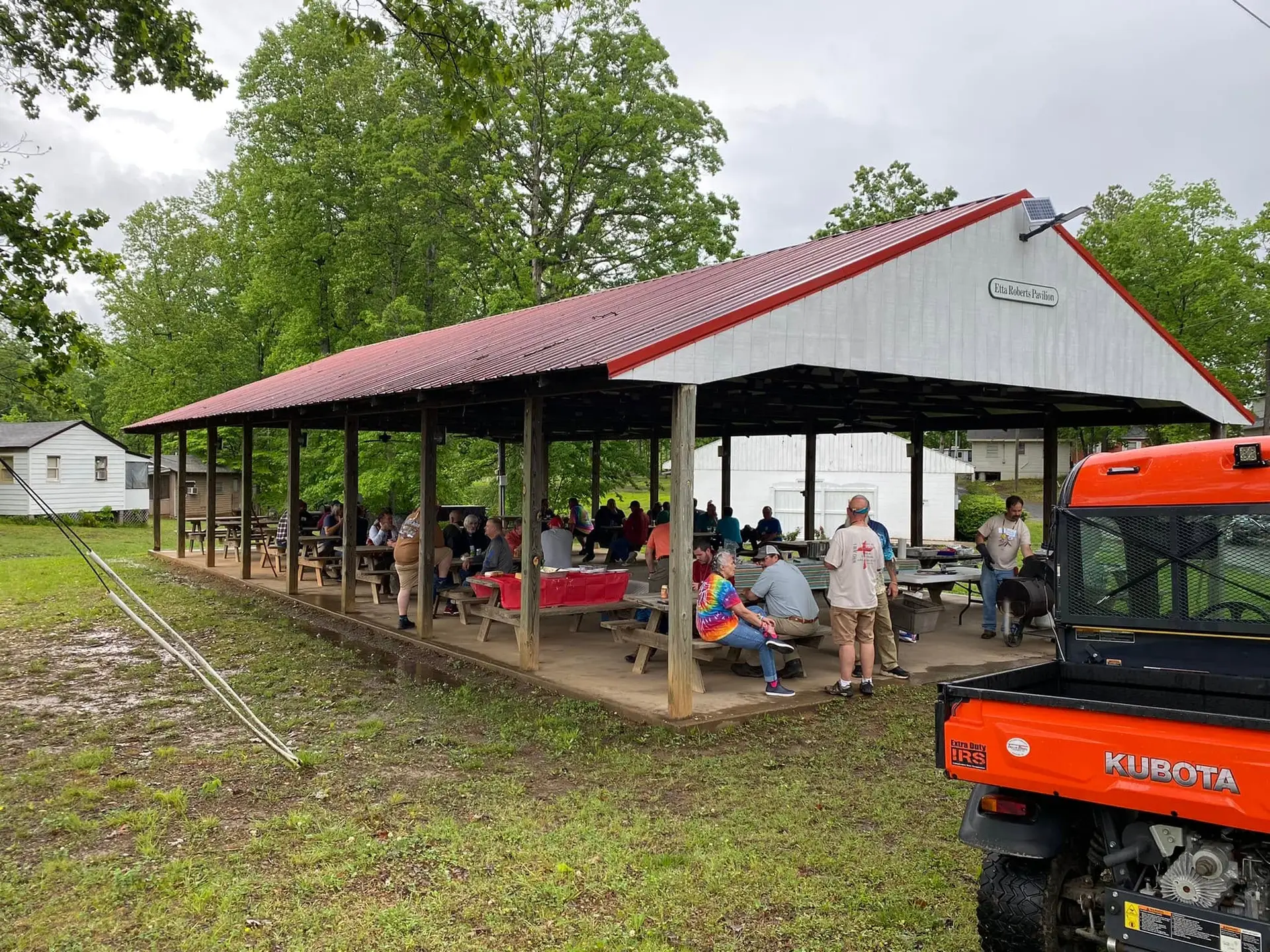Etta Roberts Pavilion with picnic tables on the retreat center grounds