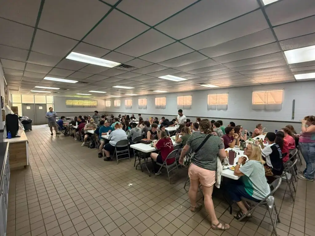 Group sharing a meal in Littrell Dining Hall